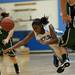 Skyline junior Kendayll Hughes dives for a loose ball on Friday. Daniel Brenner I AnnArbor.com